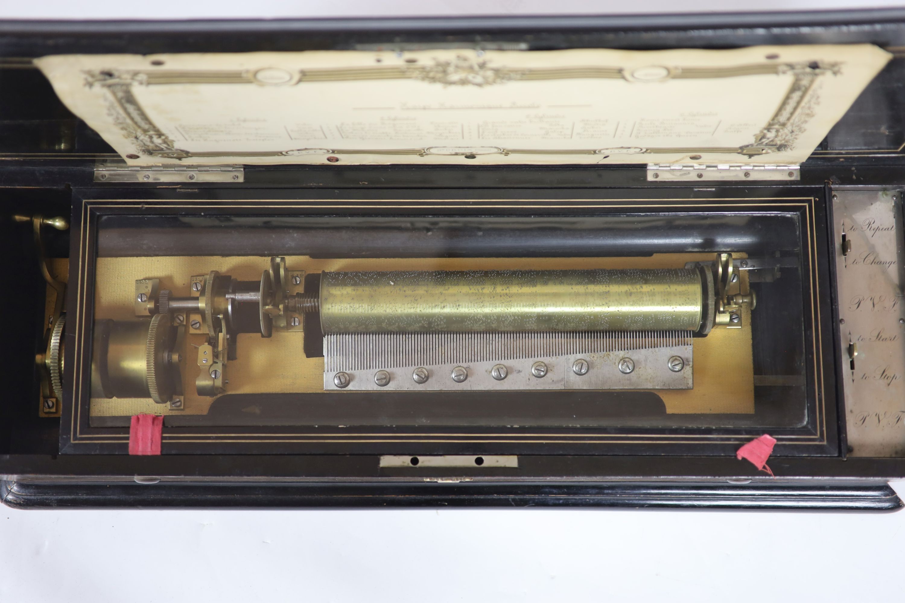 A late 19th century Swiss harpe harmonique piccolo cylinder music box H 21cm. W 84cm. D 31cm.